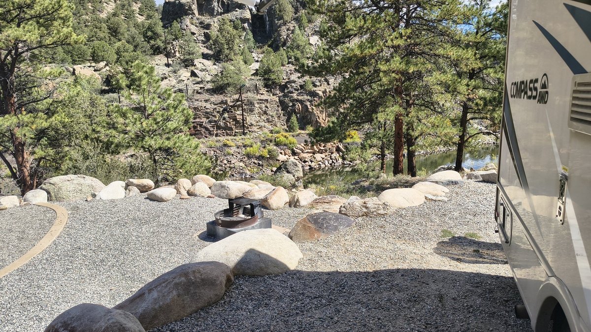 Hecla Junction campsite with river and rocks from the chair